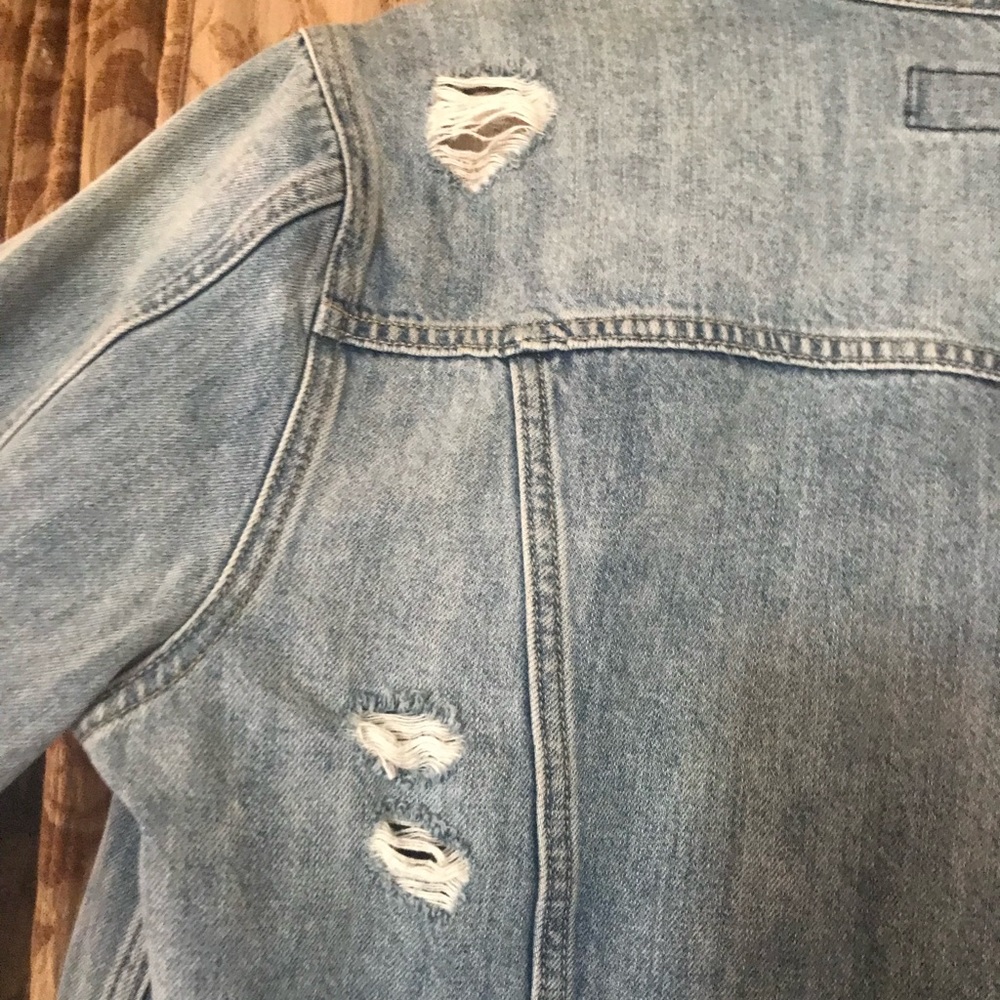 Distressed jean jacket, lots of rips and vintage looking. Comfy too - Picture 5 of 7